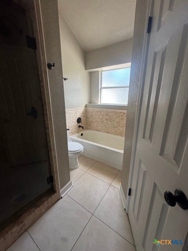5524 Denmans Mountain Road Belton, TX 76513 - Photo 10 of 15 a bathroom with a toilet and a shower
