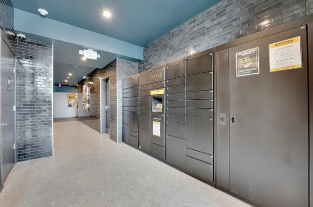 a kitchen with wooden cabinets and a stove
