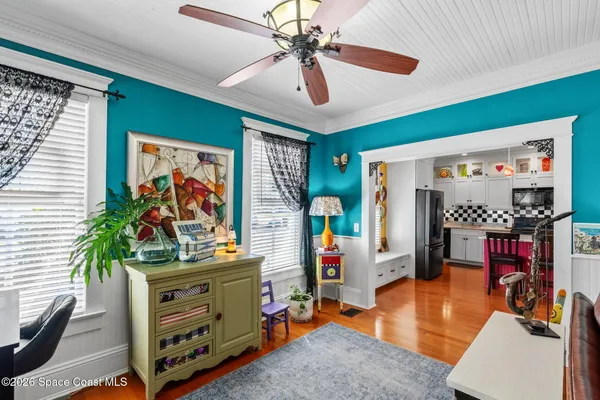 a living room with furniture and a window