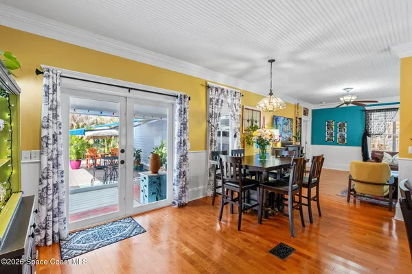 a swimming pool with outdoor seating