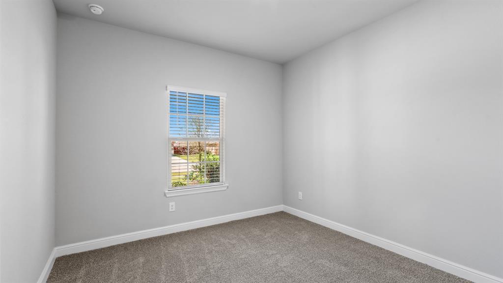 1909 Cookes Lane Cleburne, TX 76033 - Photo 21 of 40 an empty room with a window