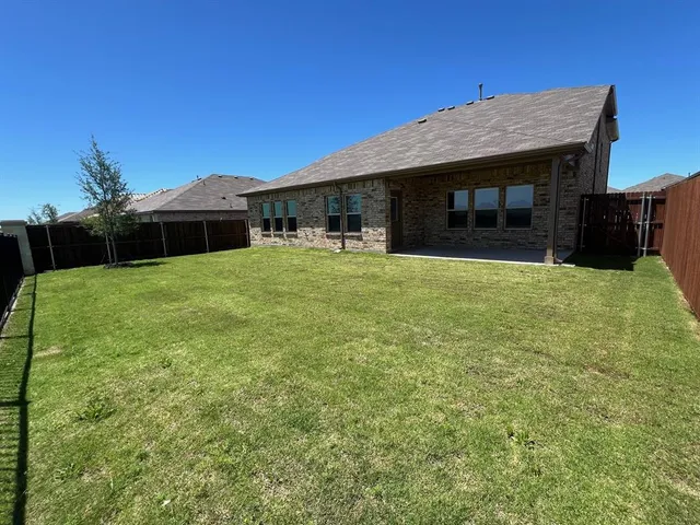 a bathroom with a toilet and a bathtub