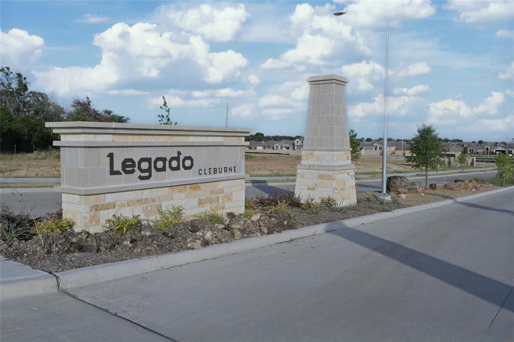 1909 Cookes Lane Cleburne, TX 76033 - Photo 34 of 40 a view of a sign board with buildings in the background