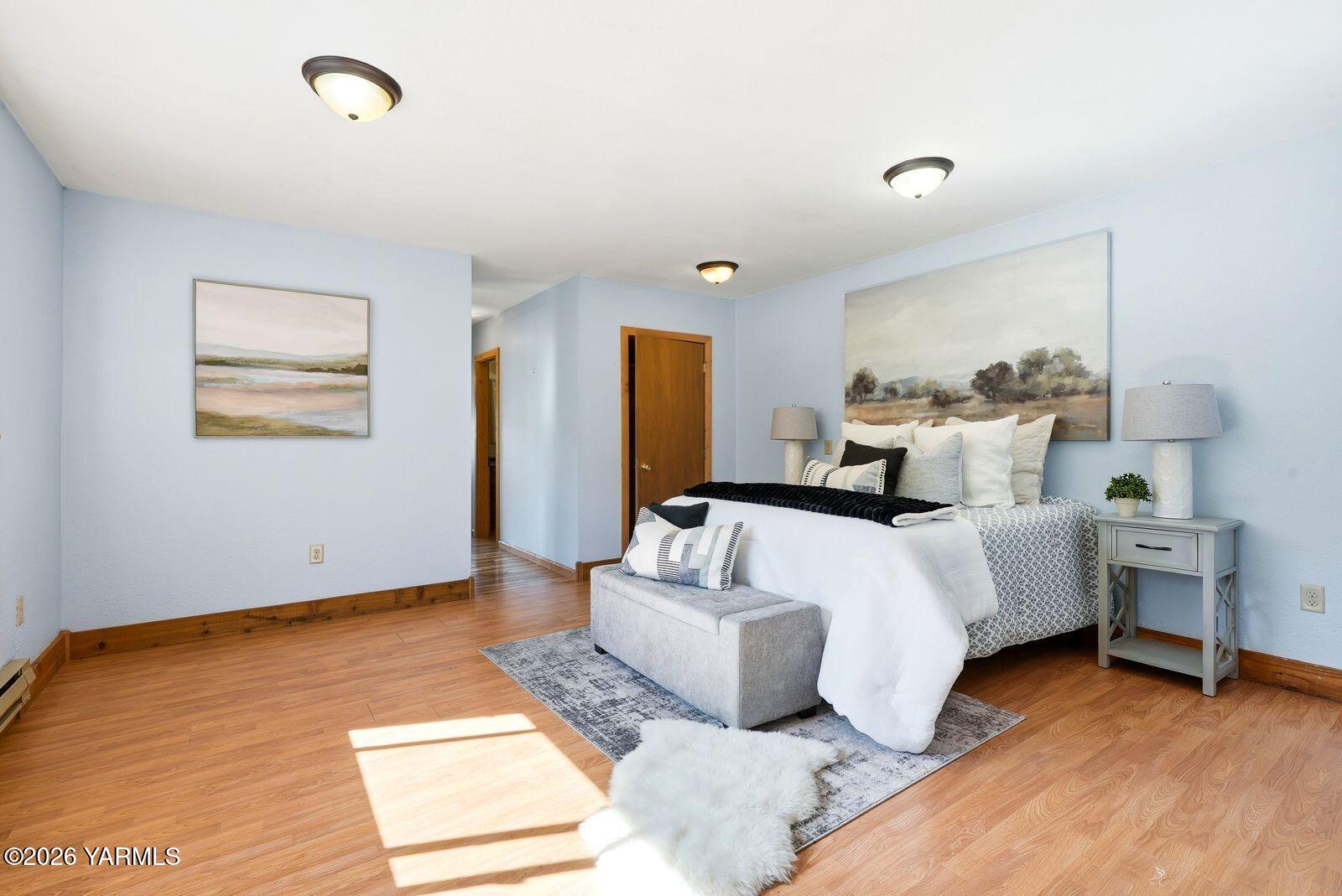 3780 Nile Road Naches, WA 98937 - Photo 13 of 43 a bedroom with a large bed and a window