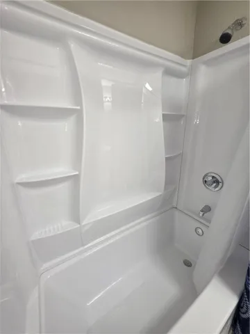 a bathroom with a bathtub