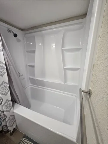 a bathroom with a bathtub