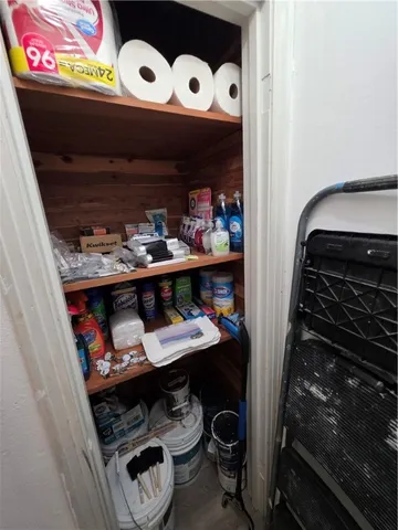 a kitchen with a stove and cabinets