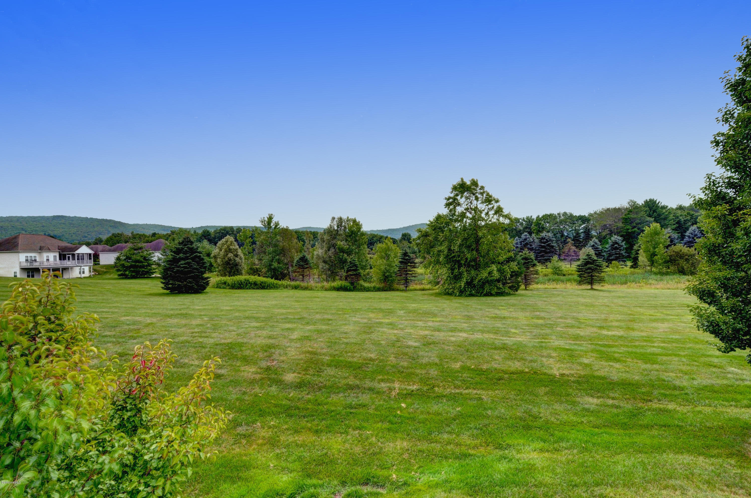 124 Red Barn Road, Unit 124 Dalton, MA 01226 - Photo 27 of 36 Back Yard