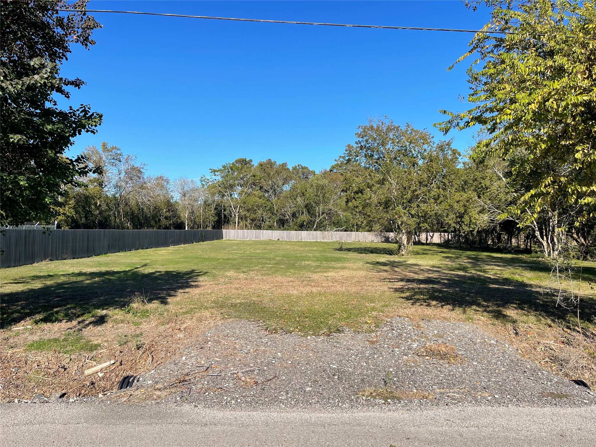 1 Middleton Street Bacliff, TX 77518 - Photo 3 of 3 a view of a field with trees around
