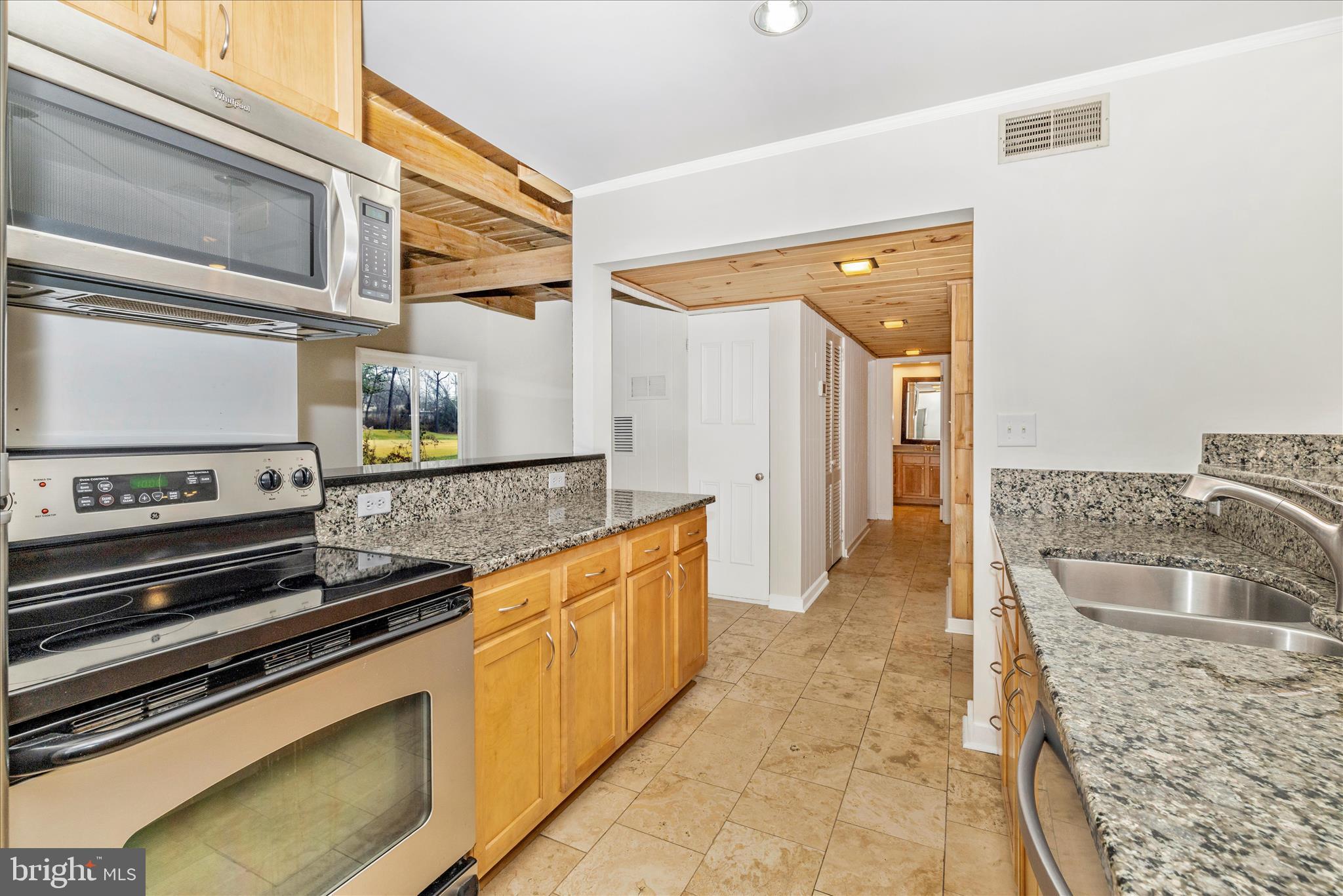 12819 Fountain Head Road Hagerstown, MD 21742 - Photo 13 of 65 a kitchen with stainless steel appliances granite countertop a stove and a sink