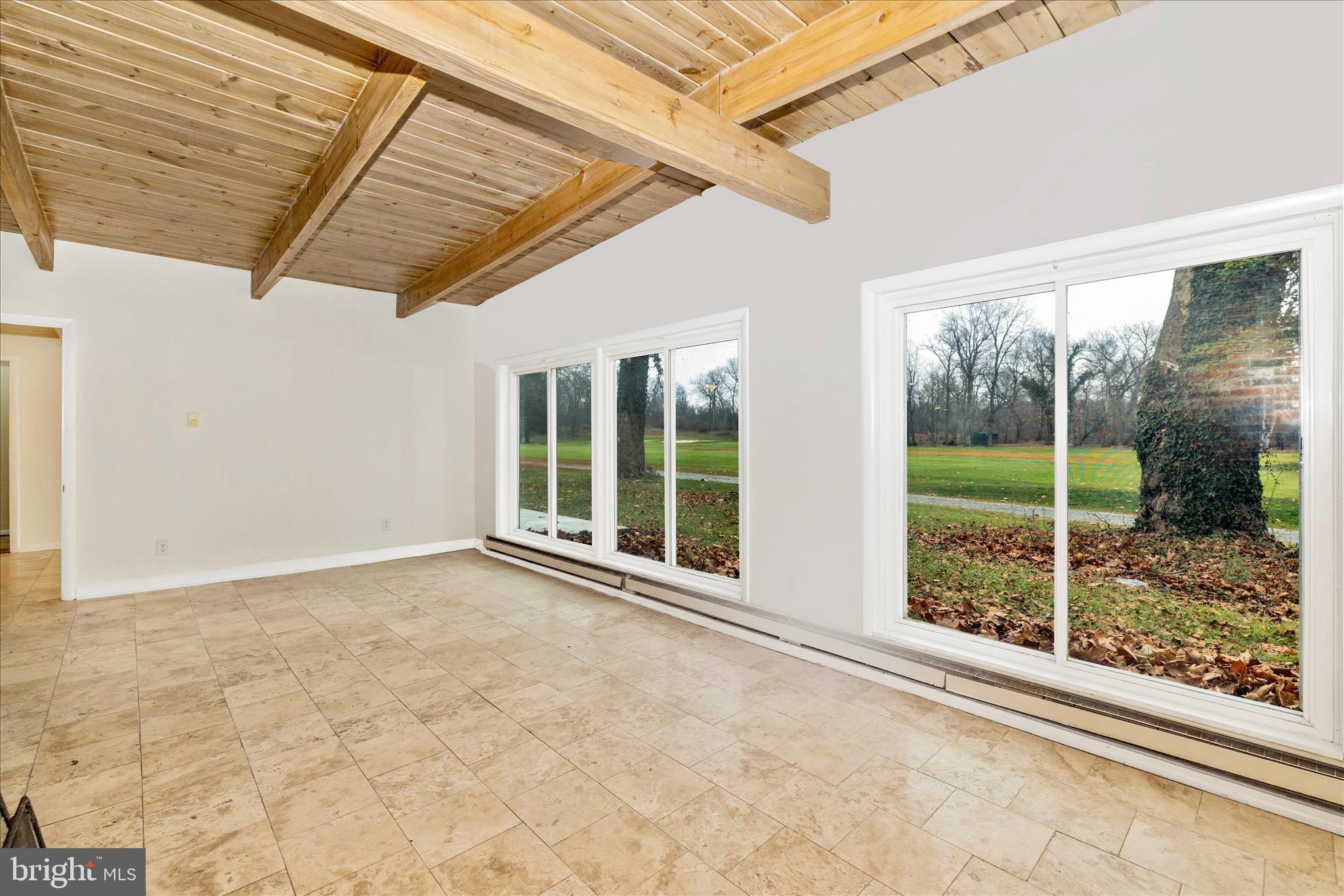 12819 Fountain Head Road Hagerstown, MD 21742 - Photo 20 of 65 a view of an empty room with windows
