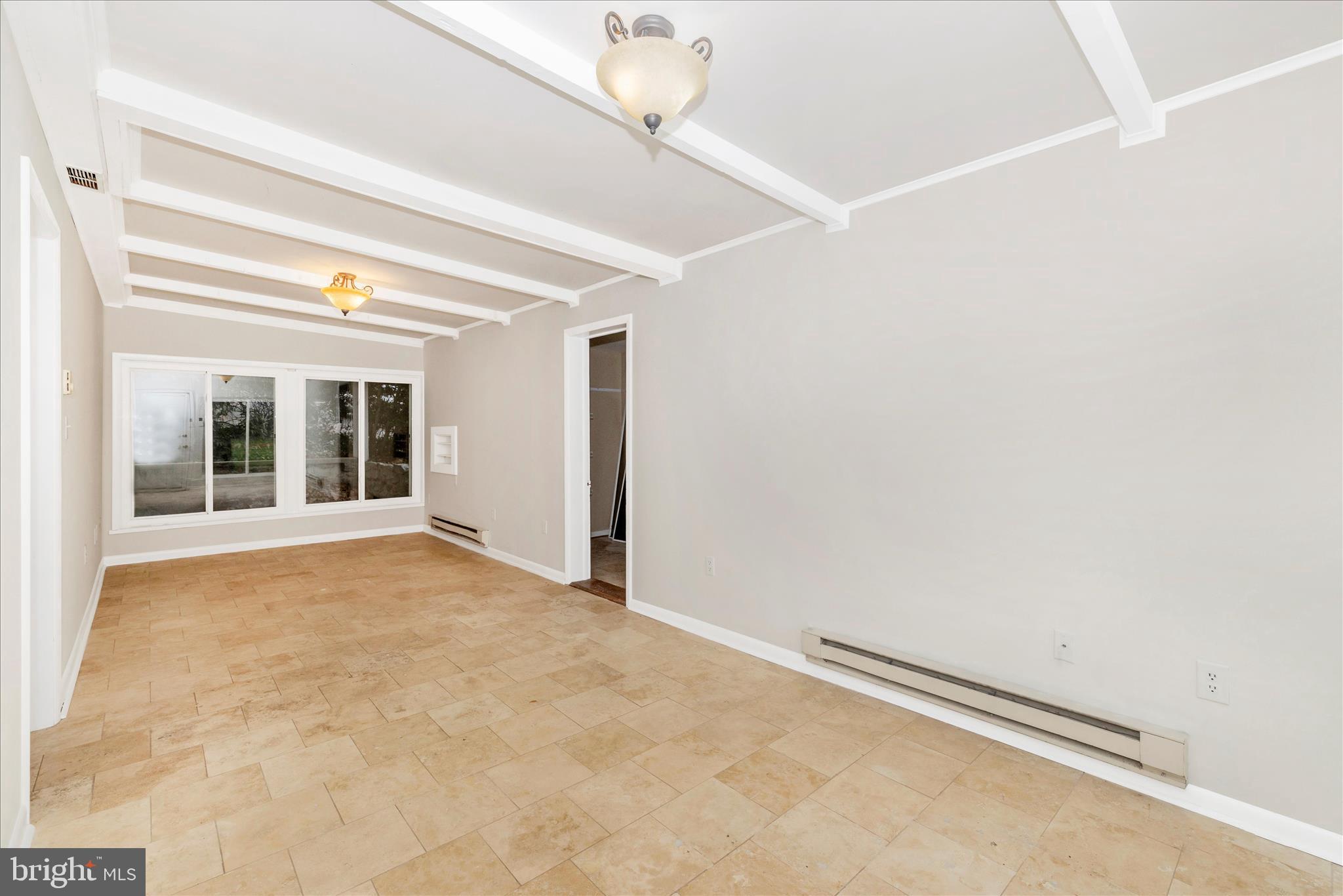 12819 Fountain Head Road Hagerstown, MD 21742 - Photo 25 of 65 a view of an empty room with a window