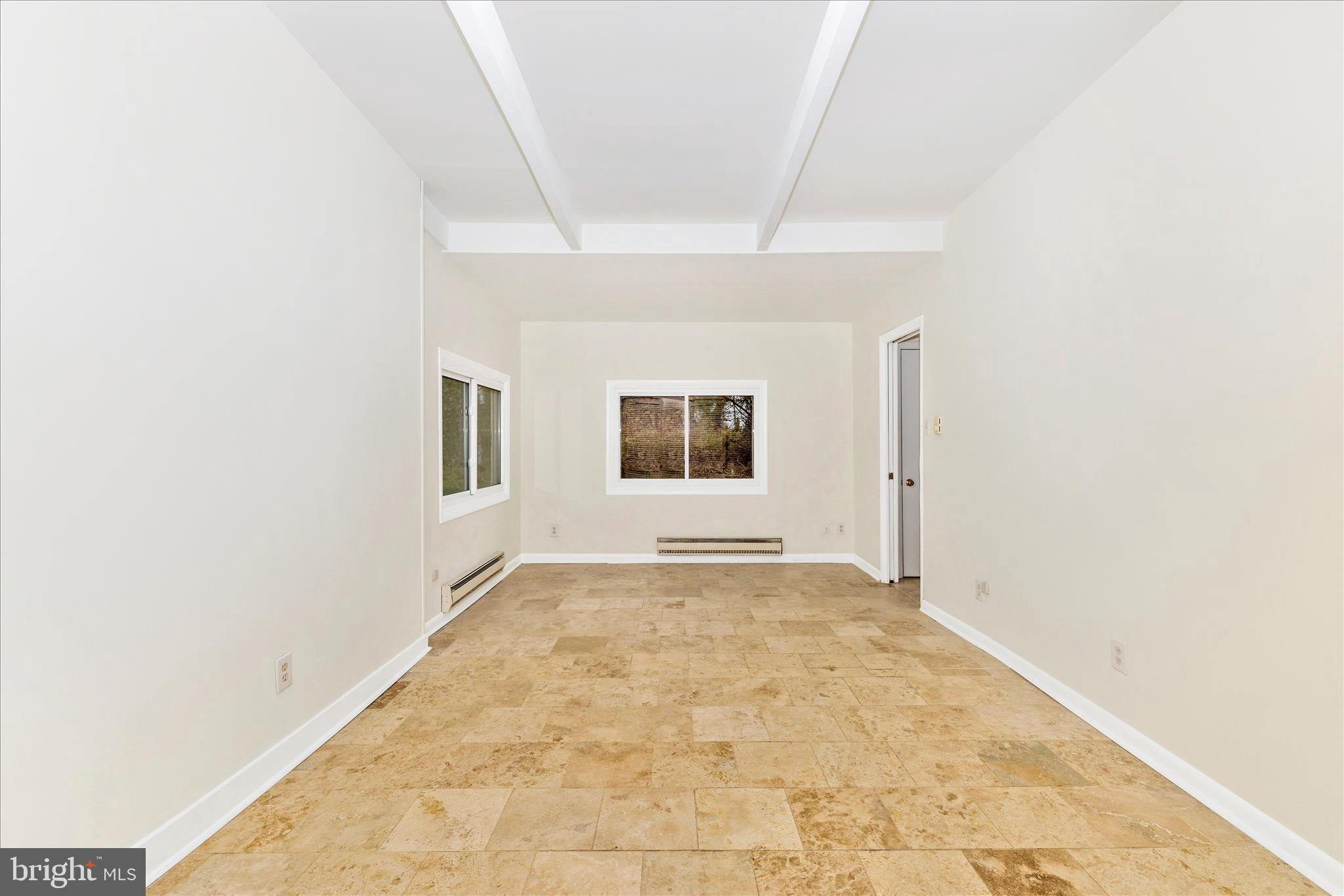 12819 Fountain Head Road Hagerstown, MD 21742 - Photo 30 of 65 an empty room with windows