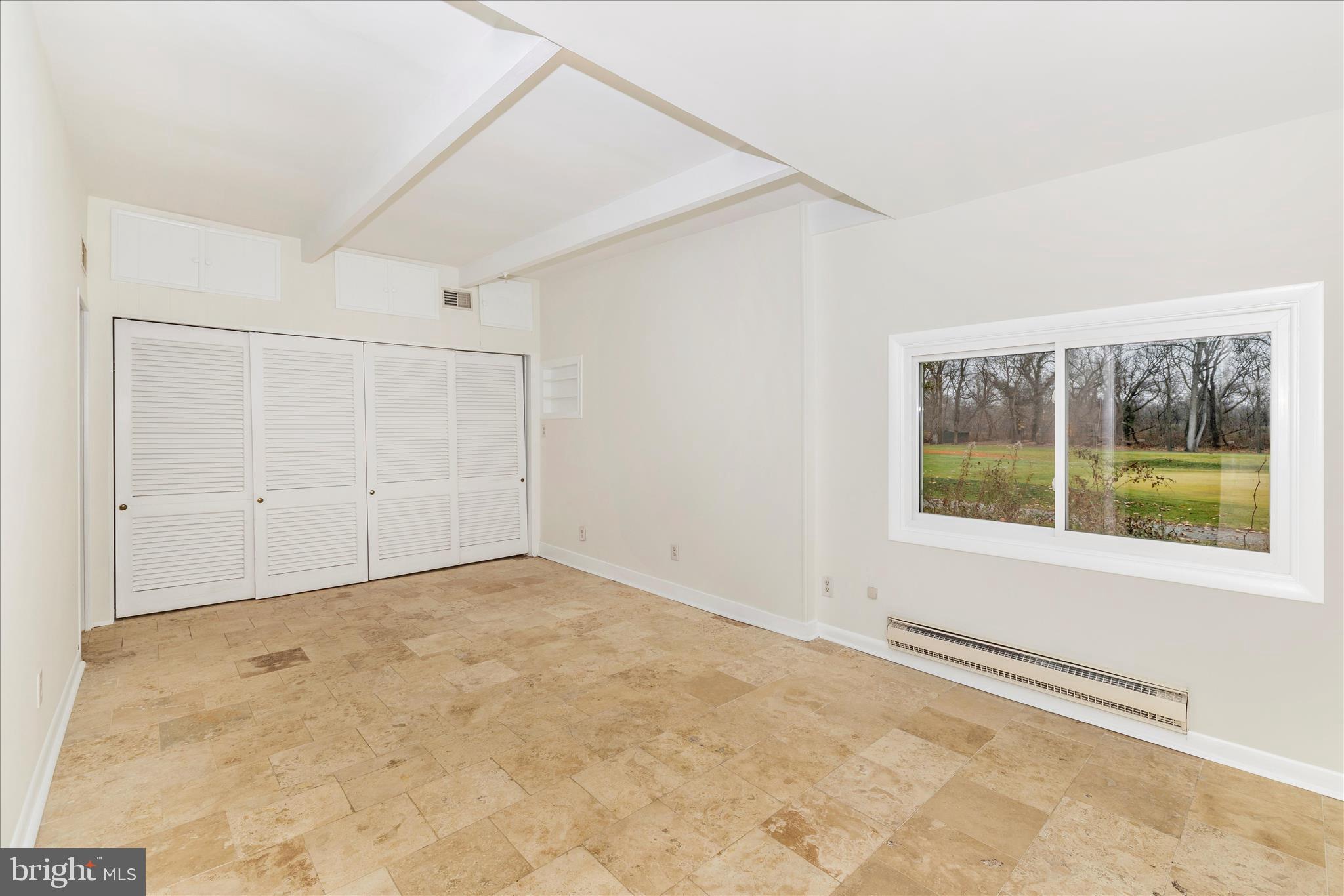 12819 Fountain Head Road Hagerstown, MD 21742 - Photo 32 of 65 a view of an empty room with a window