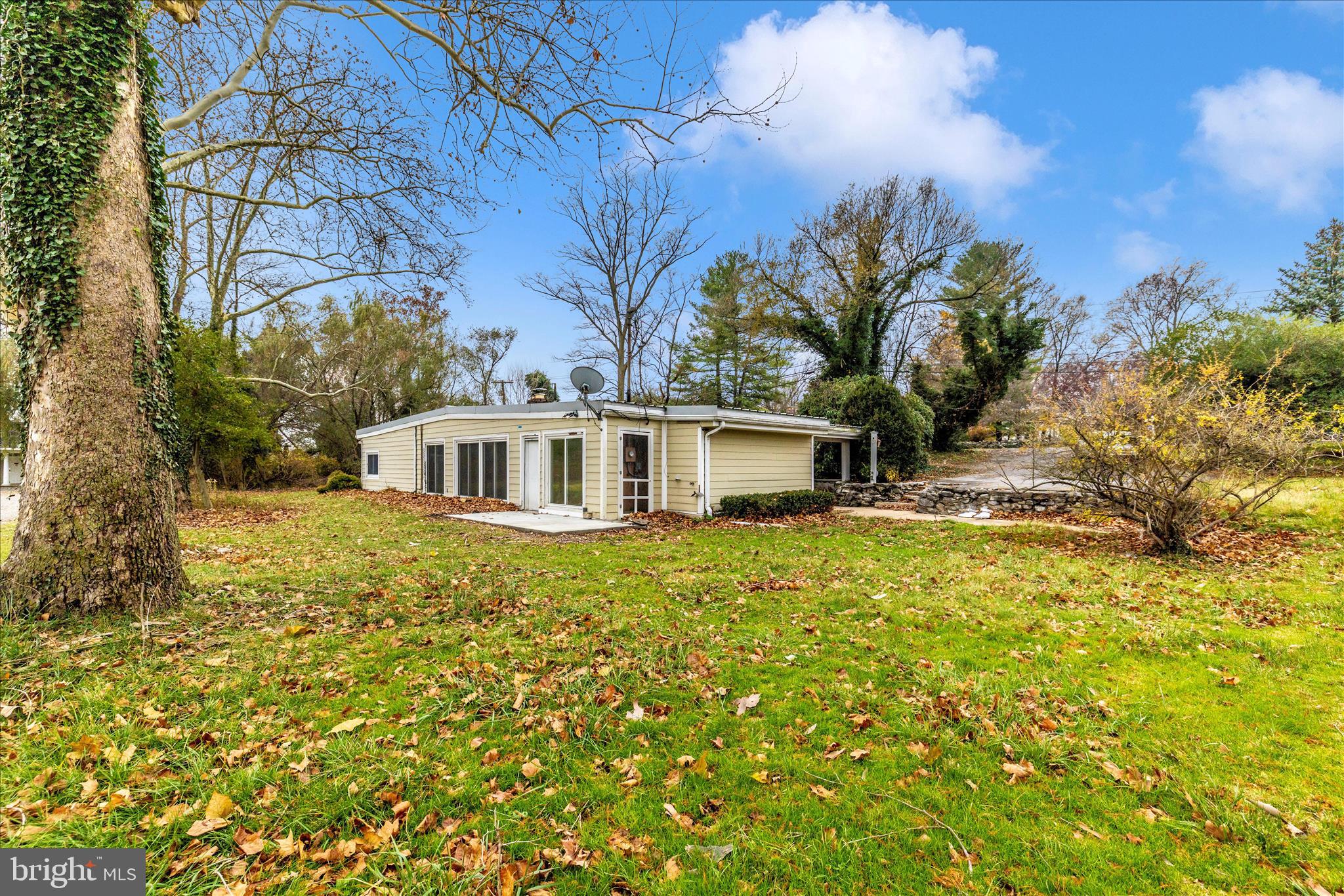 12819 Fountain Head Road Hagerstown, MD 21742 - Photo 42 of 65 a front view of a house with a garden