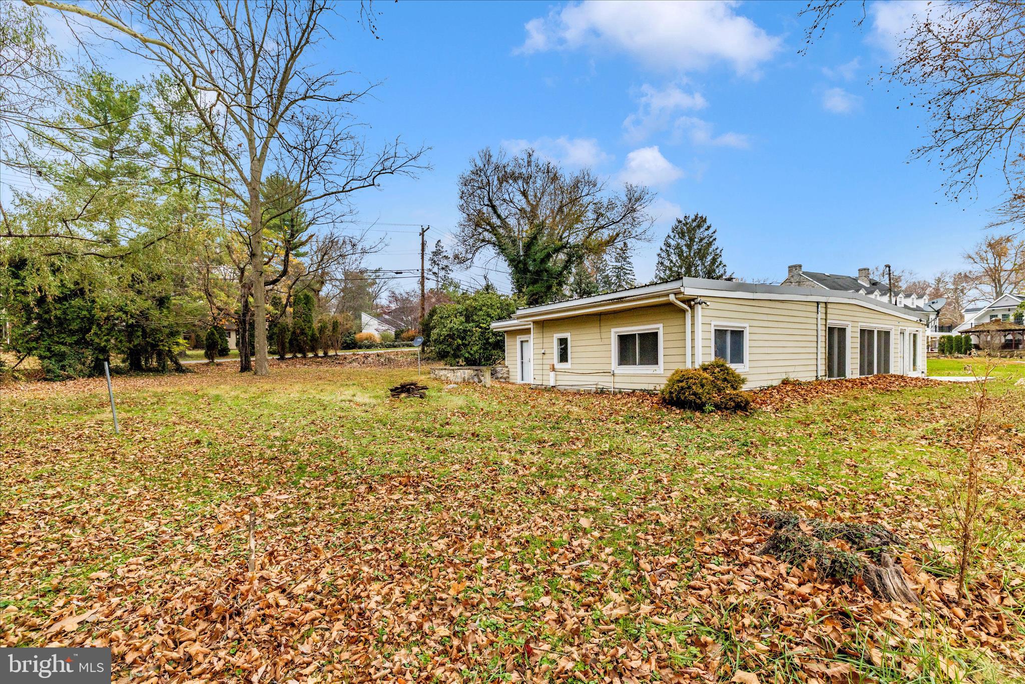 12819 Fountain Head Road Hagerstown, MD 21742 - Photo 45 of 65 a front view of house with yard and trees around