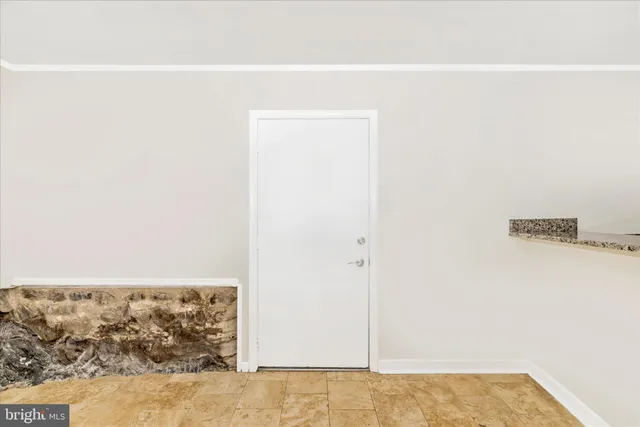 a view of a room with a window