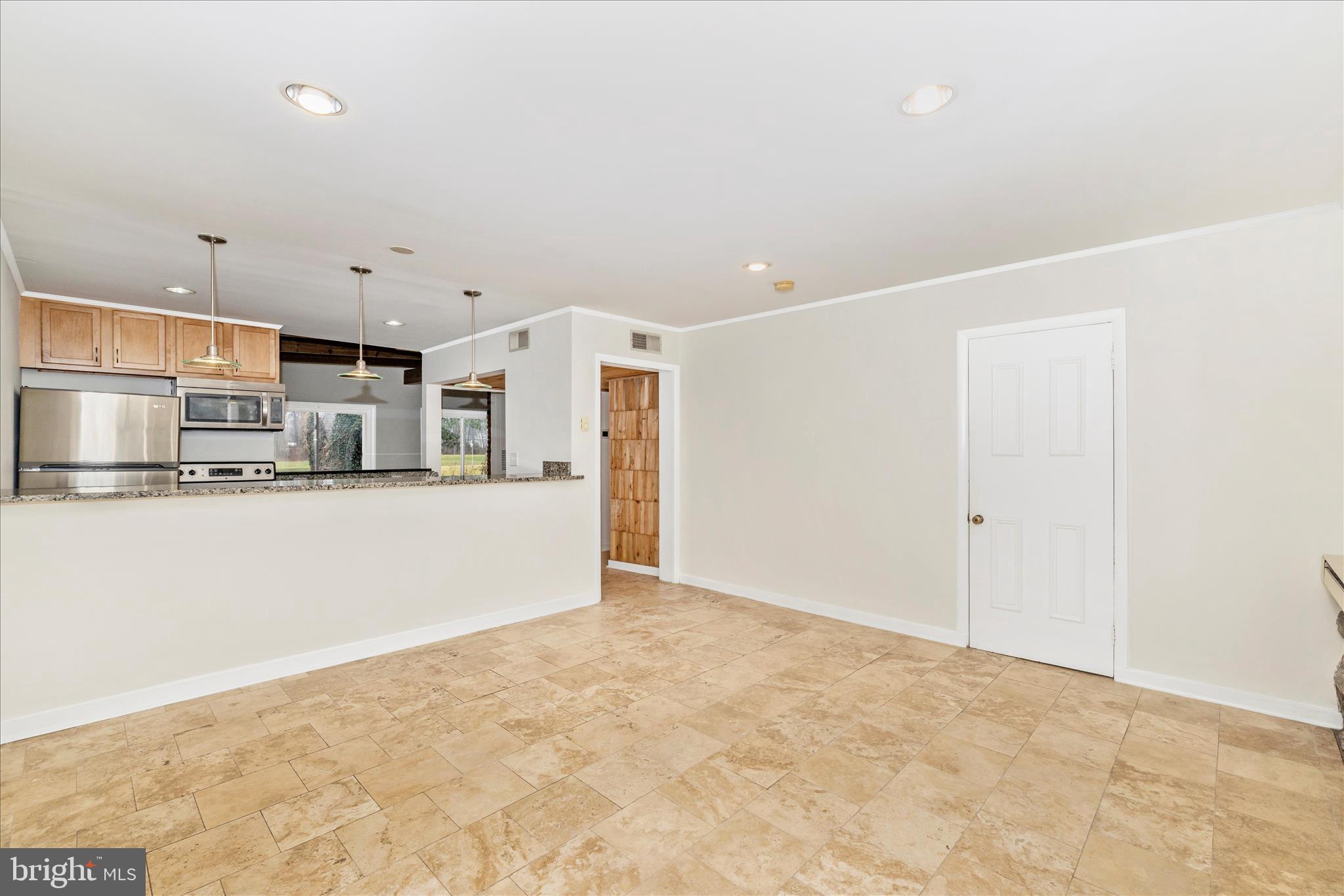 12819 Fountain Head Road Hagerstown, MD 21742 - Photo 6 of 65 a view of kitchen with refrigerator cabinets and wooden floor