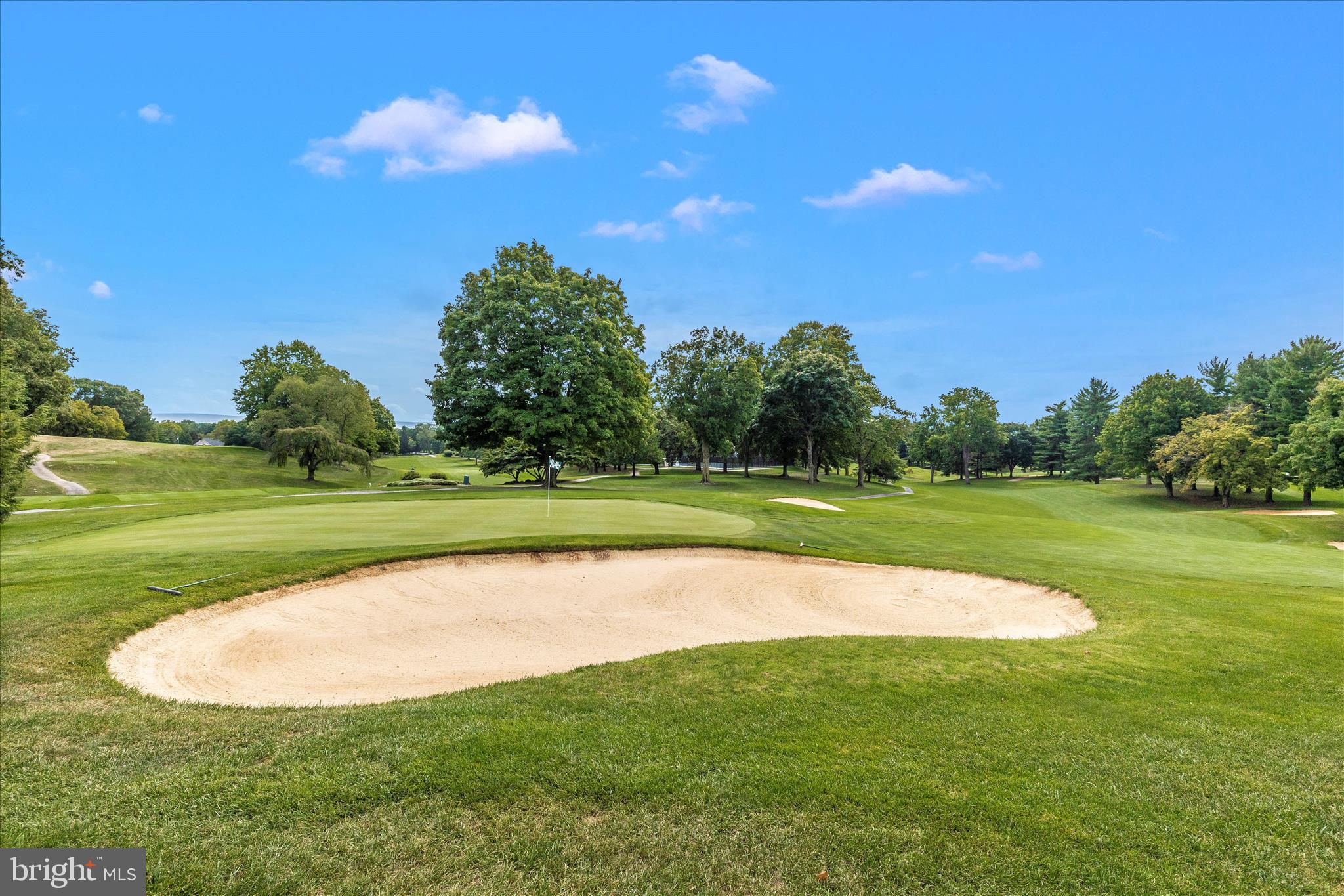 12819 Fountain Head Road Hagerstown, MD 21742 - Photo 61 of 65 a view of a golf course with a lake