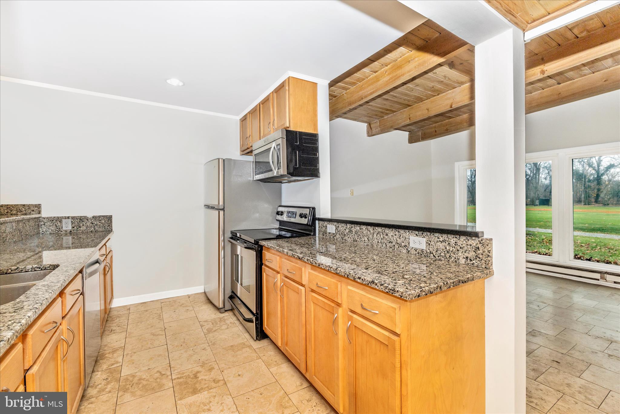 12819 Fountain Head Road Hagerstown, MD 21742 - Photo 10 of 65 a kitchen with stainless steel appliances granite countertop a sink and a stove