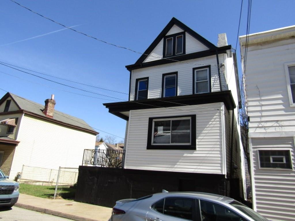215 Anthony Street Pittsburgh, PA 15210 - Photo 2 of 39 a view of a house with a street view