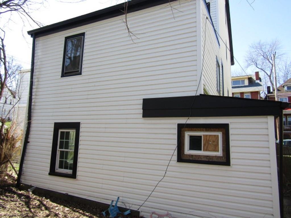 215 Anthony Street Pittsburgh, PA 15210 - Photo 3 of 39 a front view of a house with windows