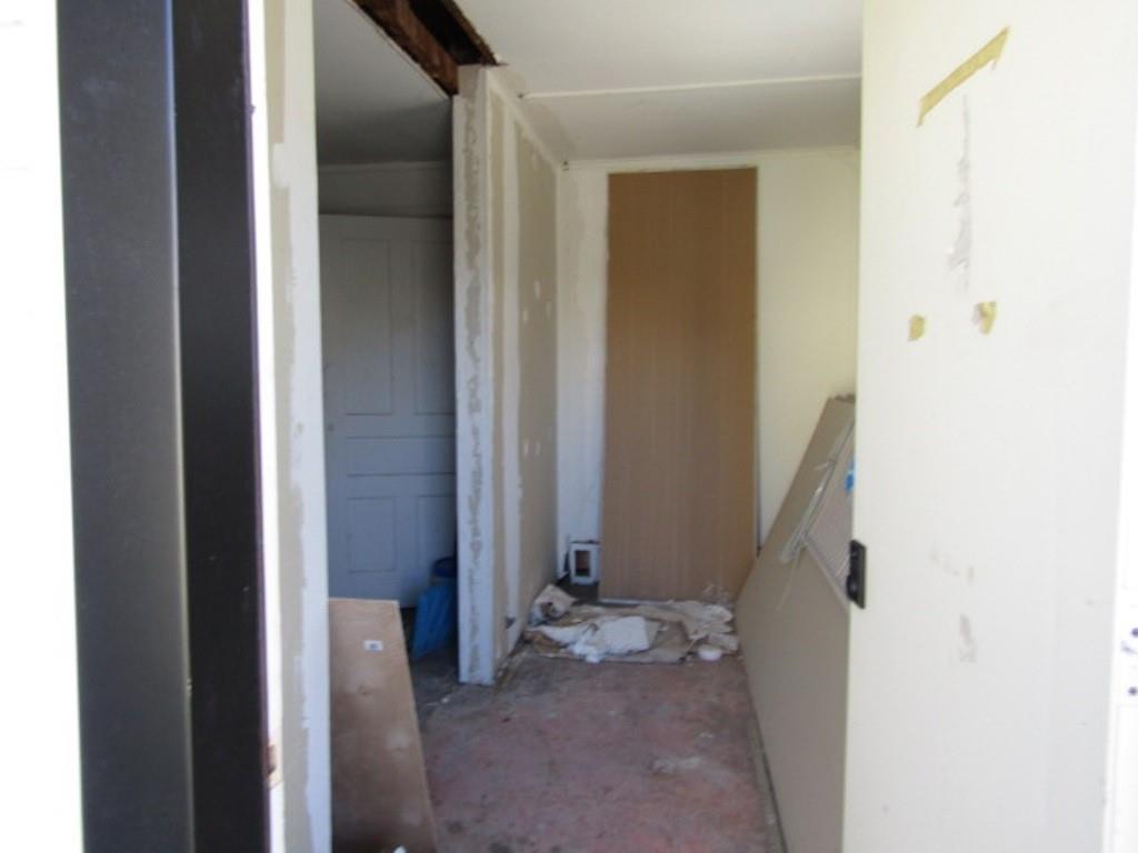 215 Anthony Street Pittsburgh, PA 15210 - Photo 4 of 39 a view of a hallway with wooden floor and entryway