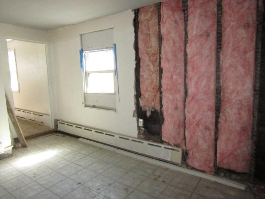 215 Anthony Street Pittsburgh, PA 15210 - Photo 9 of 39 an empty room with windows