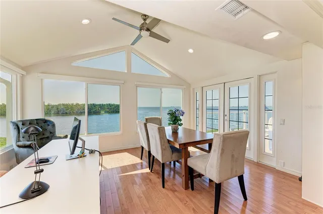 an aerial view of a house with a lake view