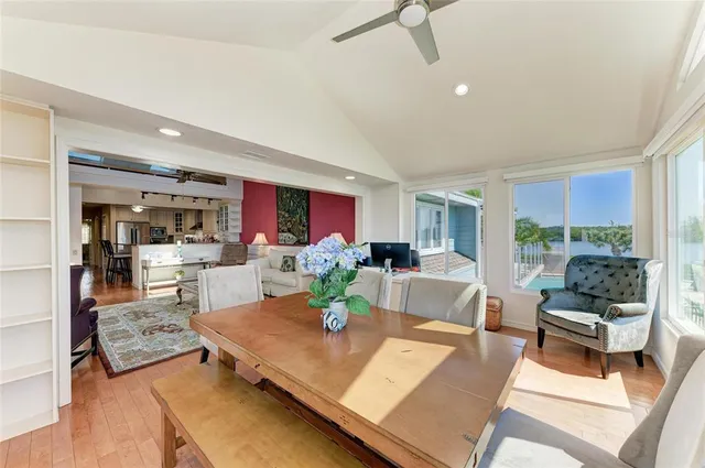 an aerial view of a house with garden space and street view