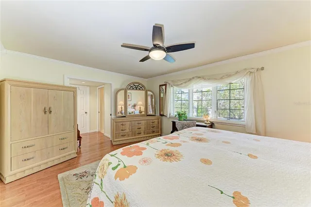 an aerial view of a house with a lake view