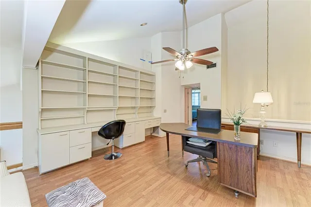 a view of a patio with table and chairs