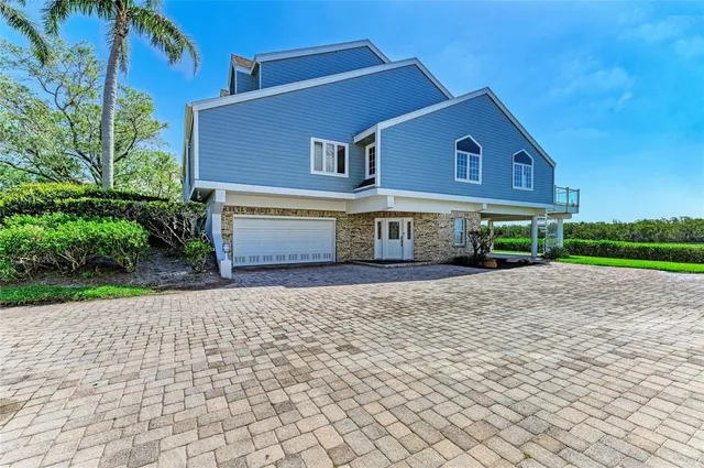 a living room with fireplace furniture and a flat screen tv