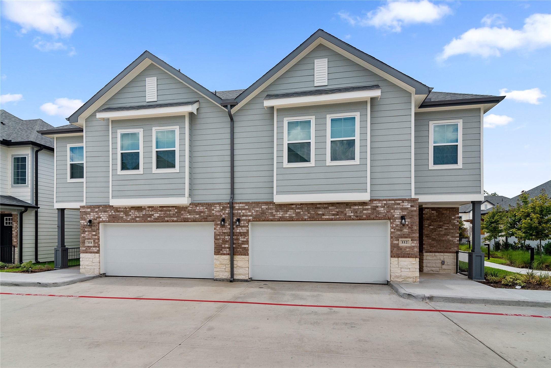 28328-613 Birnham Woods Drive Spring, TX 77386 - Photo 2 of 38 a front view of a house with a garage