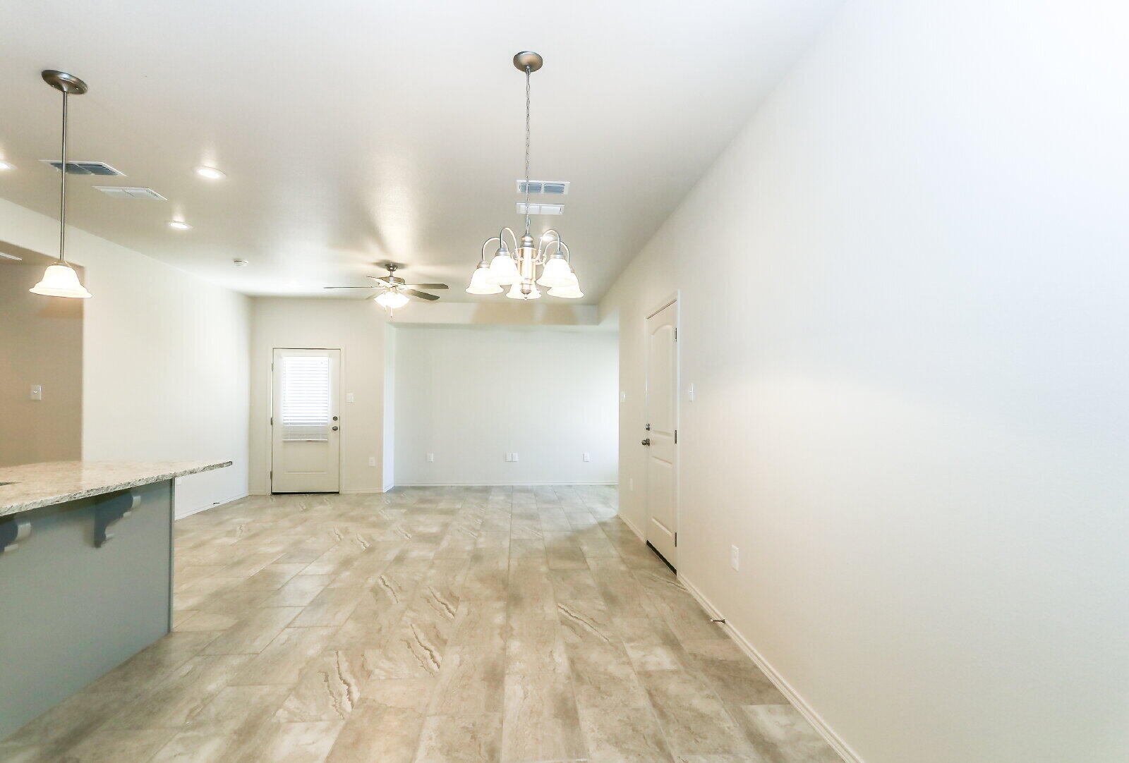 6905 67th Street, Unit B Lubbock, TX 79424 - Photo 17 of 35 a view of a chandelier in a room
