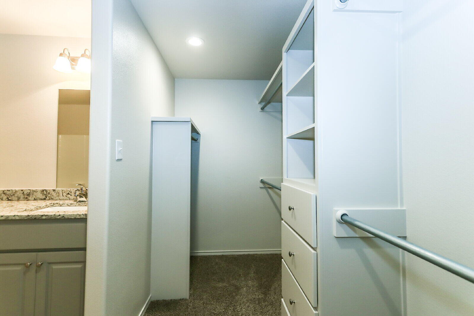 6905 67th Street, Unit B Lubbock, TX 79424 - Photo 26 of 35 a view of walk in closet with window