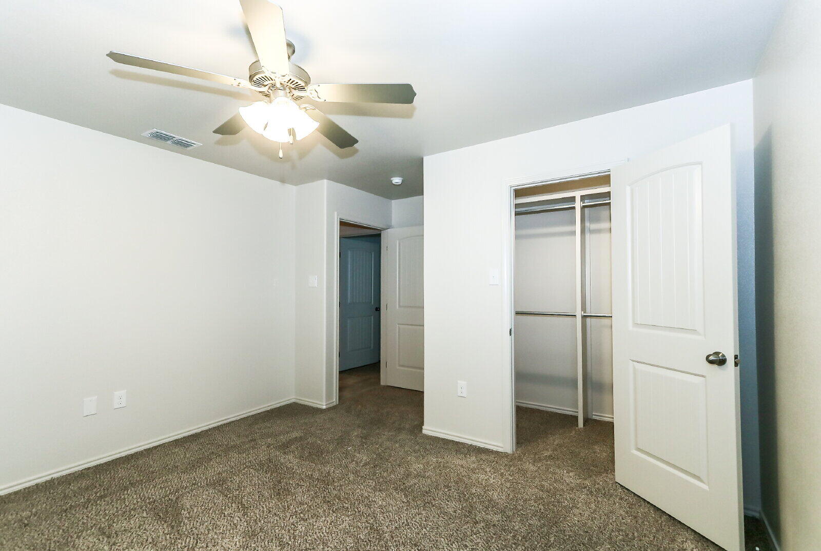 6905 67th Street, Unit B Lubbock, TX 79424 - Photo 29 of 35 a view of a room with a ceiling fan