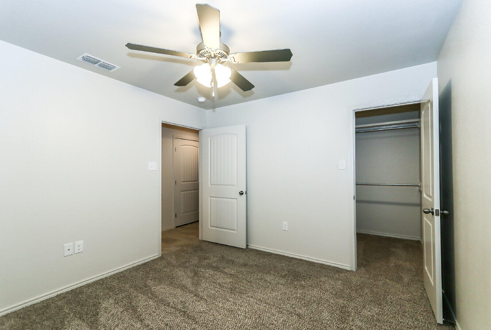 6905 67th Street, Unit B Lubbock, TX 79424 - Photo 34 of 35 wooden floor in an empty room