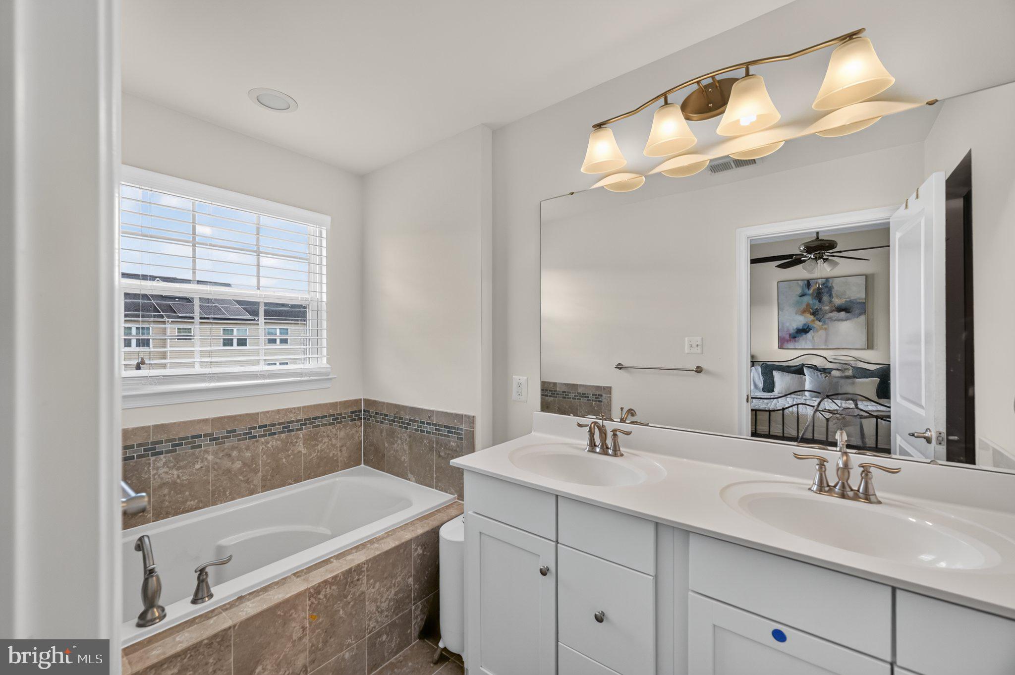 6357 Walcott Lane Frederick, MD 21703 - Photo 18 of 35 Bright and airy modern bathroom retreat.