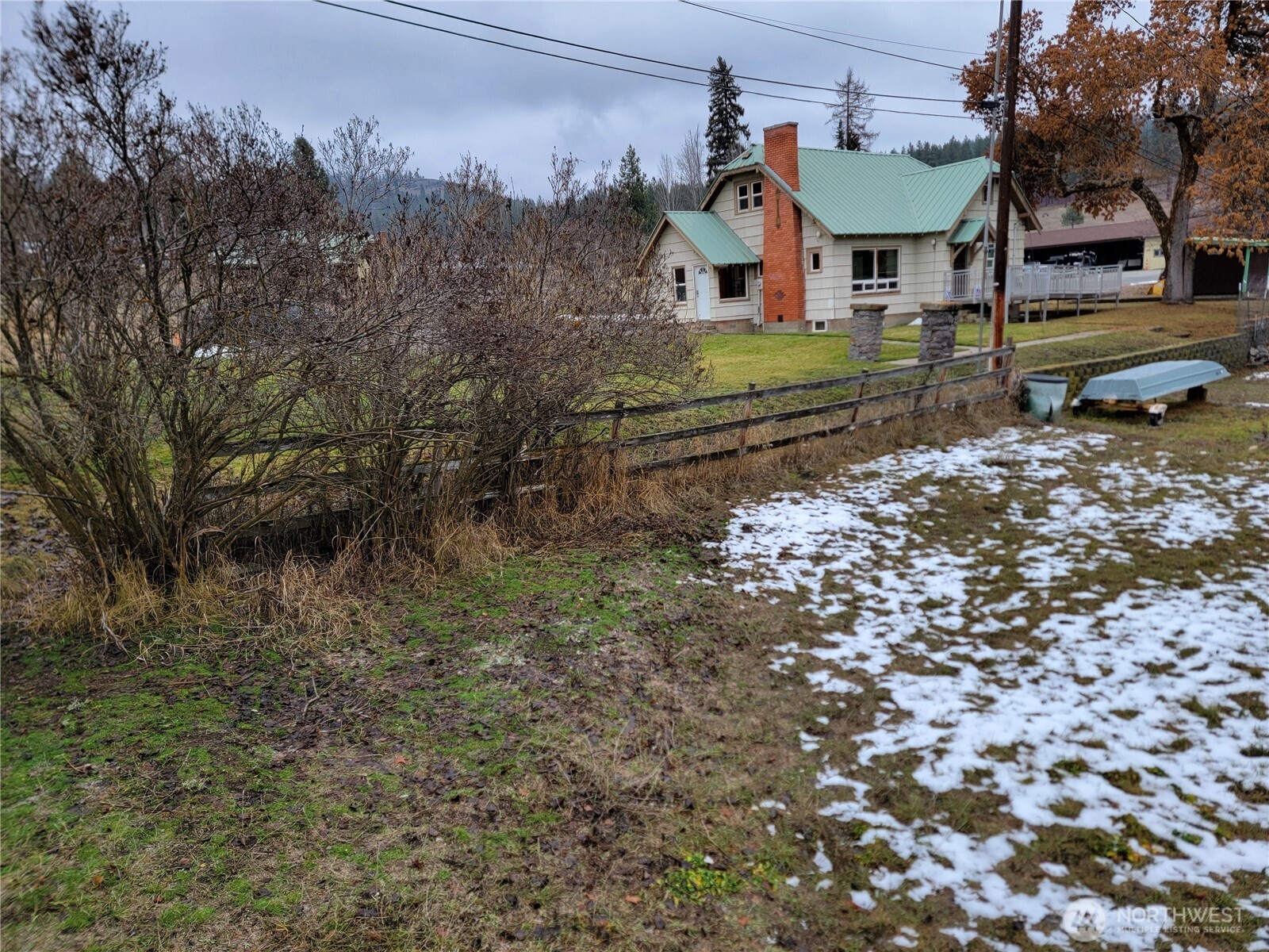 166 North Jefferson Street Republic, WA 99166 - Photo 20 of 20 a view of a house with a yard