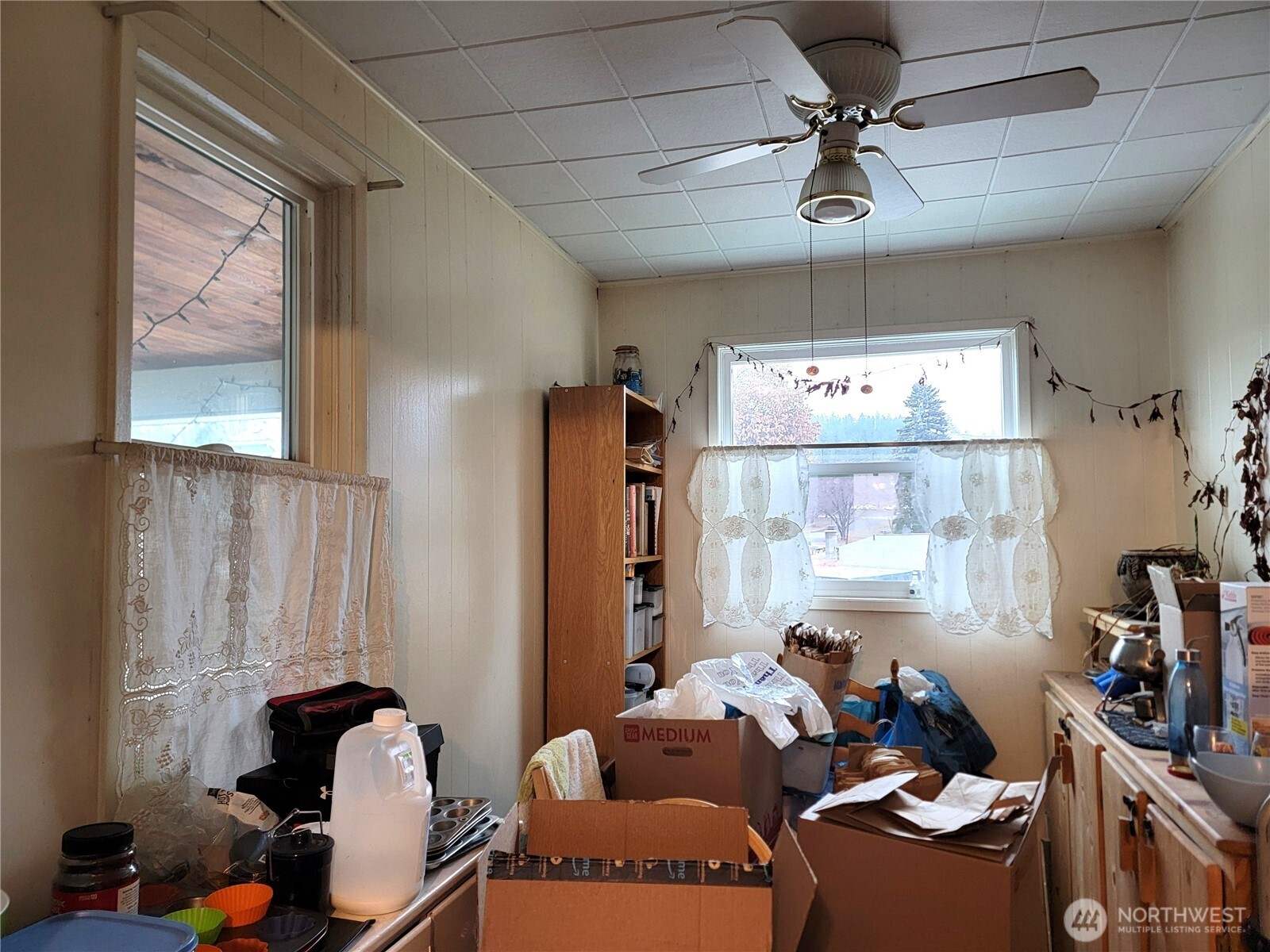 166 North Jefferson Street Republic, WA 99166 - Photo 8 of 20 a living room with furniture and a large window