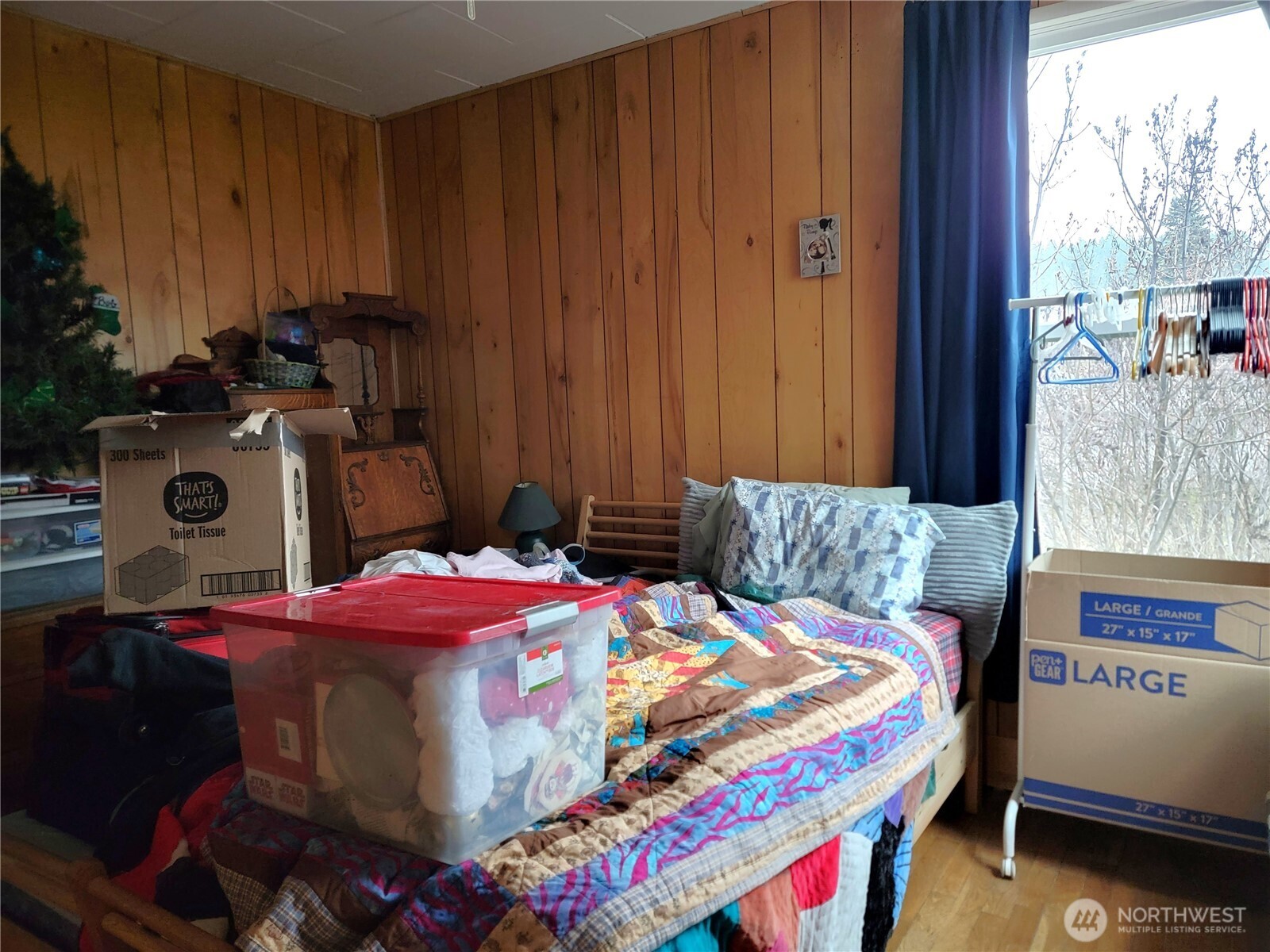 166 North Jefferson Street Republic, WA 99166 - Photo 9 of 20 a bedroom with bed and a window