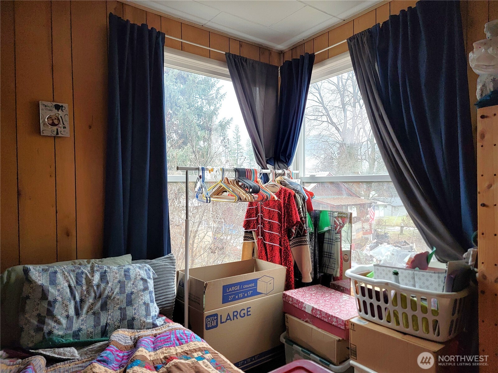 166 North Jefferson Street Republic, WA 99166 - Photo 10 of 20 a living room with furniture and a window