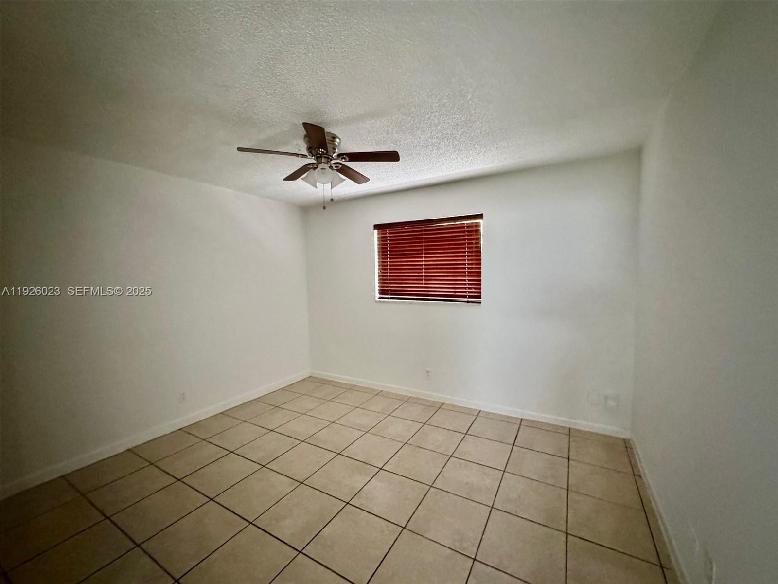 718 Southwest 7th Street, Unit 718 Hallandale Beach, FL 33009 - Photo 8 of 13 a view of an empty room