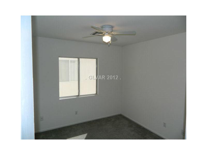 5959 Crumbling Ridge Street Henderson, NV 89011 - Photo 18 of 35 Bedroom. BEDROOM 2 UPSTAIRS