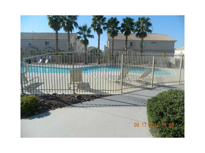 5959 Crumbling Ridge Street Henderson, NV 89011 - Photo 33 of 35 Other. PLENTY OF ROOM FOR SUNNING AROUND THE COMMUNITY POOL
