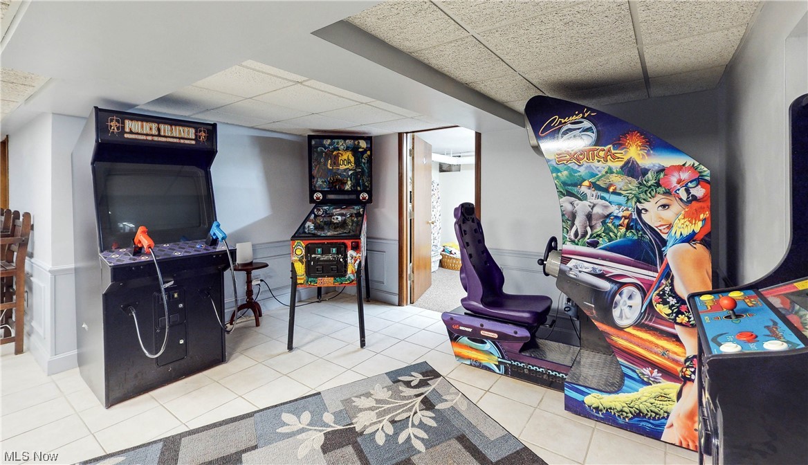 785 Merriman Road Akron, OH 44303 - Photo 24 of 34 Rec room with a drop ceiling and light tile flooring