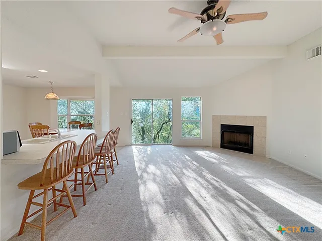 a view of a livingroom with furniture window and outside view