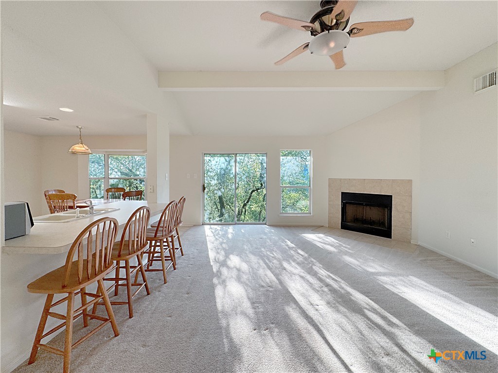 a view of a livingroom with furniture window and outside view