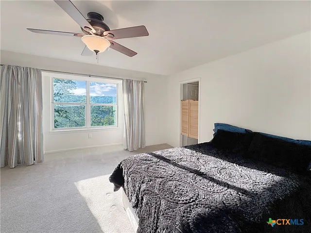a bathroom with a tub a sink and a shower